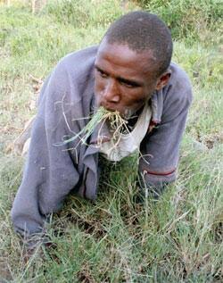 Man eats grass publicly to punish cheating neighbour hilariously!